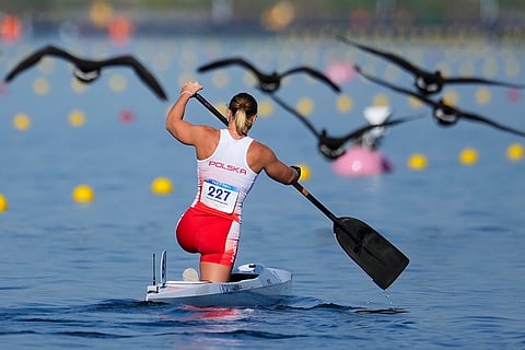 Dorota Borowska, of Poland, trains ahead of women's canoe single 200-meter heats